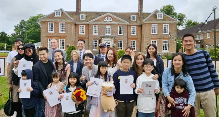 CAEB entrants with their parents posing with Warnborough College luminaries